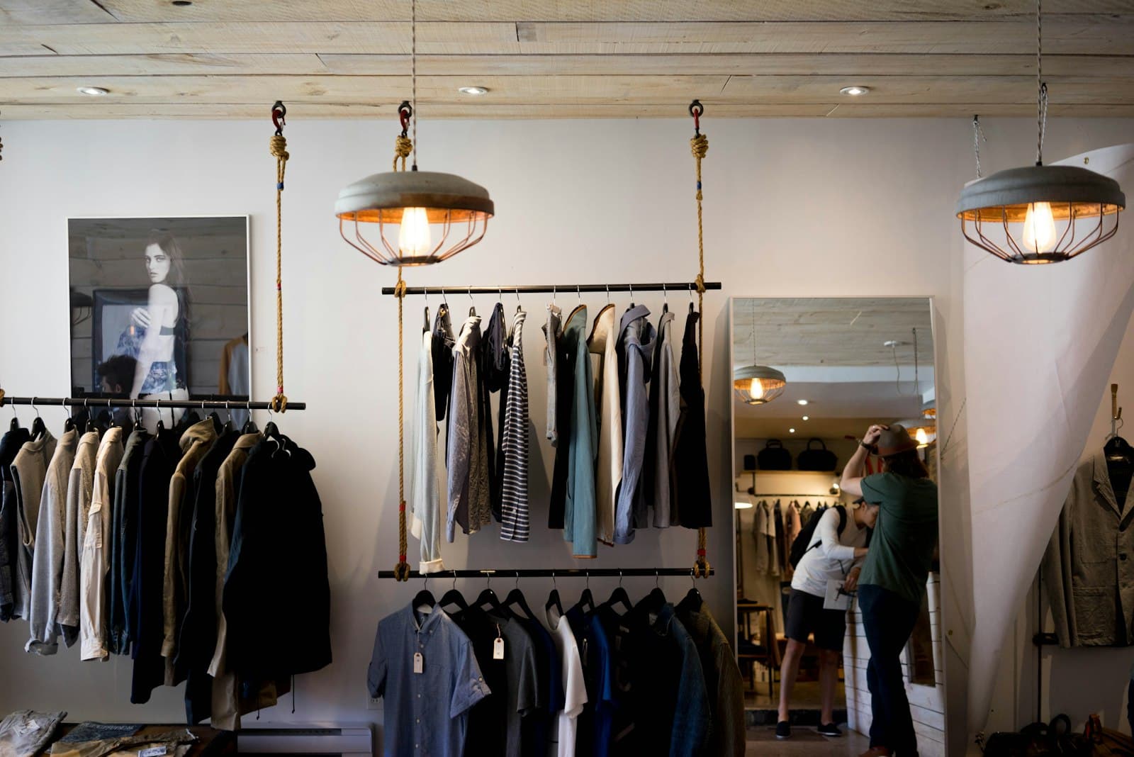 Inside the boutique — racks and the fitting mirror