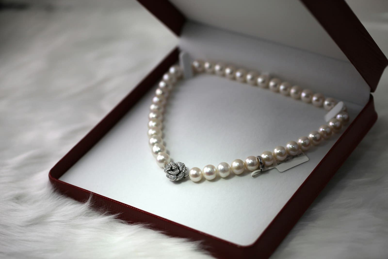 Freshwater pearl strand necklace with a silver rose clasp in a gift box